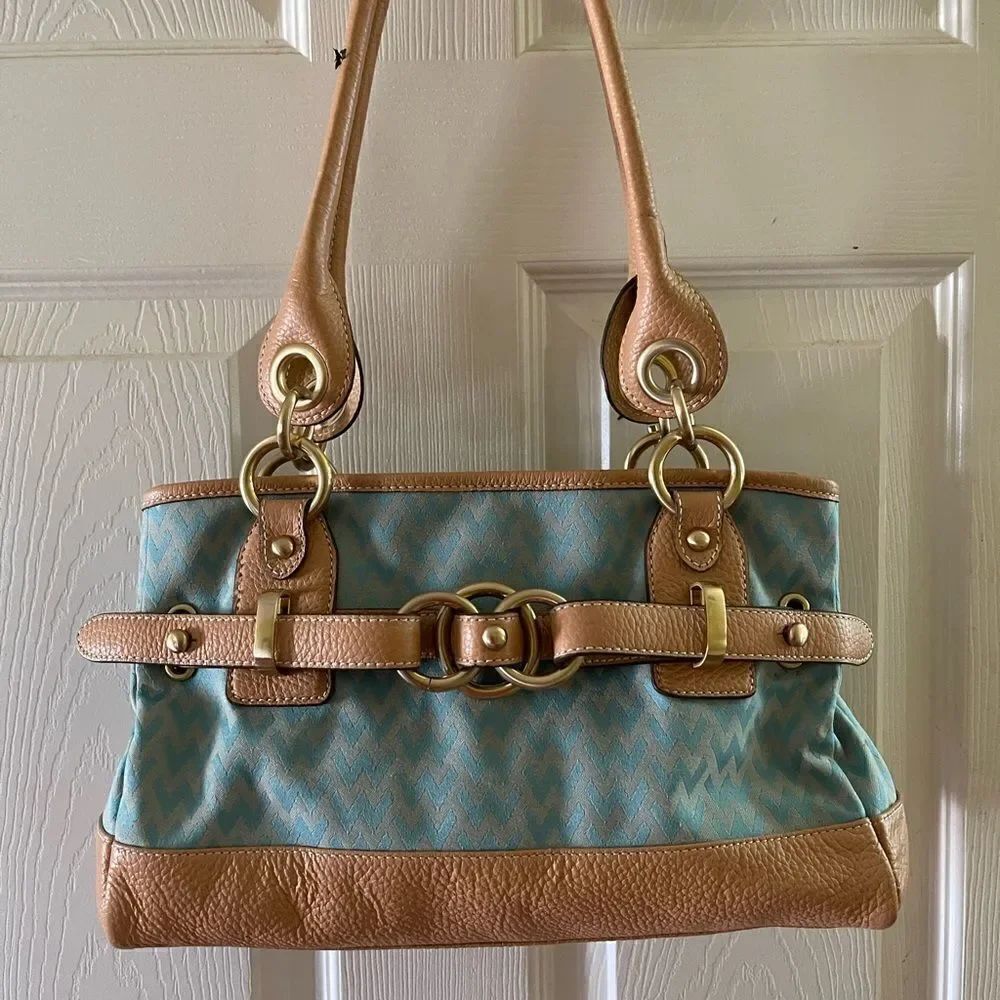 Wilson leather canvas mint green with tan leather trims & gold tone accents